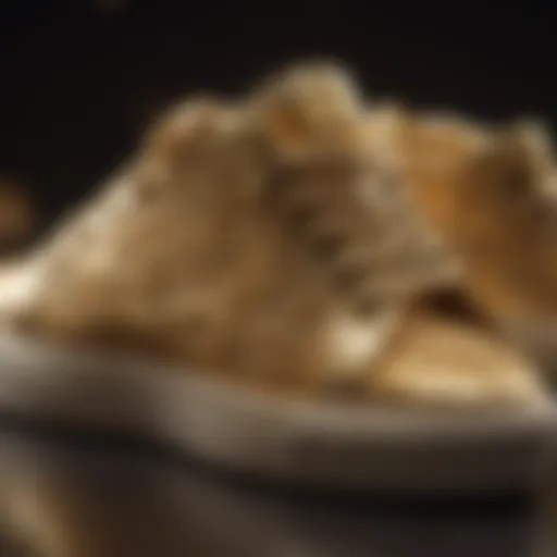 Gilt sneakers showcasing intricate design details