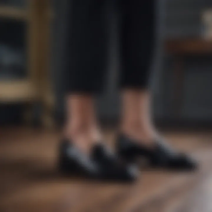 Elegant black loafers worn with a formal outfit