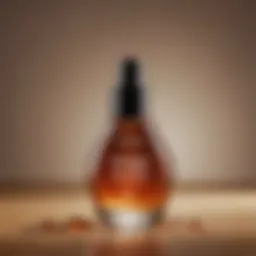 A close-up of a bottle of tanning drops against a neutral background