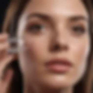 Woman applying serum to her face