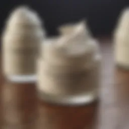 A selection of scar removal creams on a wooden surface
