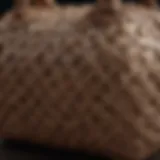 A close-up view of the intricate weave pattern on the Bottega Veneta Maxi Jodie bag