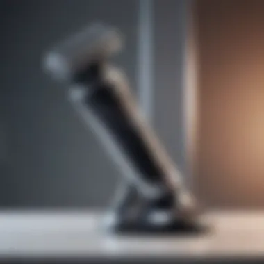 A sleek electric razor on a smooth surface