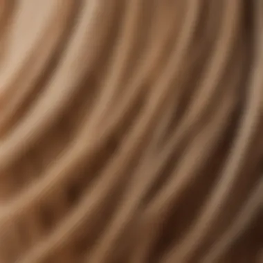 Application of Youthful Hair Tones Close-up of hair being dyed with a focus on rich, youthful tones.