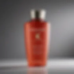 Close-up of Kerastase hair growth shampoo bottle with a sleek design
