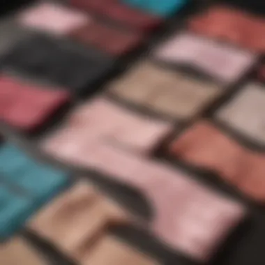 A selection of various sweat waist trainers laid out on a surface, demonstrating the range of styles available.