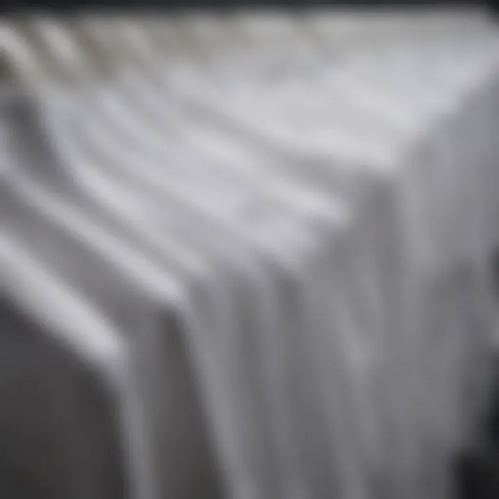 Variety of white shirts displayed in different styles