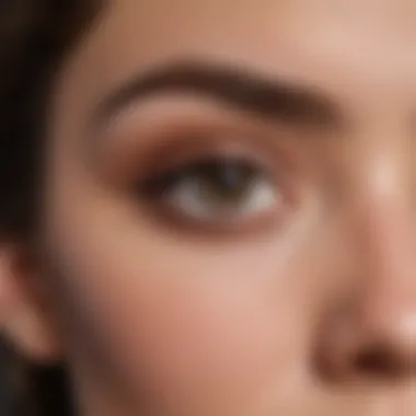 Close-up of expertly applied eyebrow dip showcasing a flawless brow